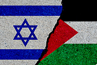 The Israeli and Palestinian flags painted onto concrete, with a crack running through the middle.