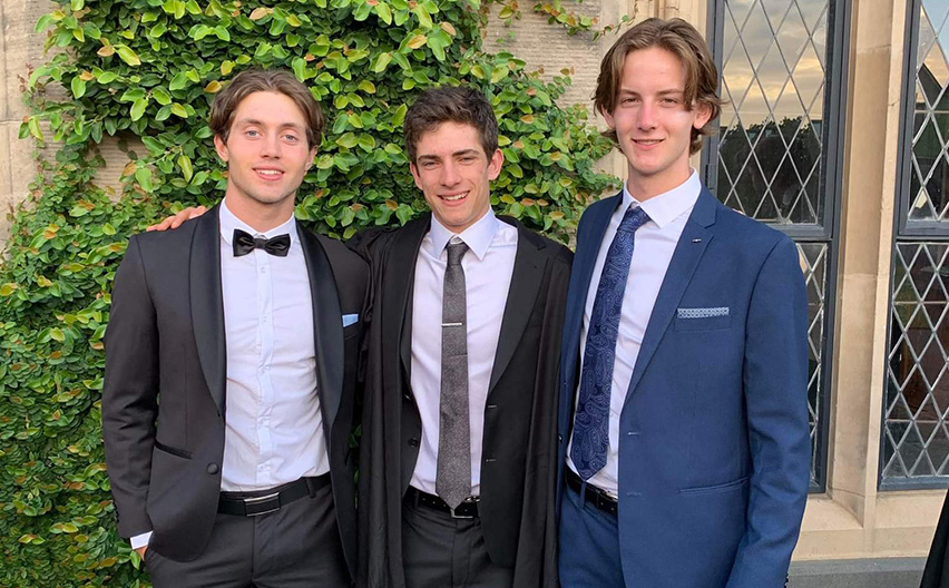 Oscar Hegge with friends at a Trinity College event
