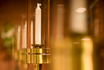 Image of chapel candles in a row