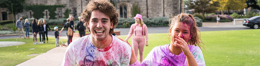 One boy and one girl playing around and having fun at one of the events at Trinity's residential college.