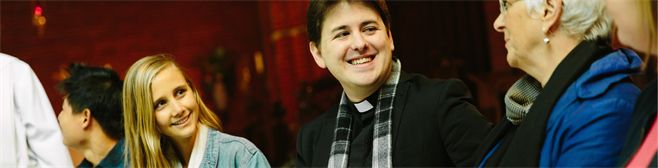 A candid image of a group of people smiling and talking about the Supervised Field Education (STFE), Ministry Education, Trinity College Theological School