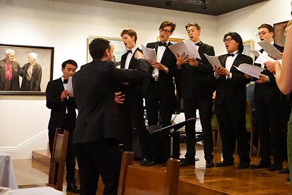 The  Trinity Tiger Tones performing  in the dining hall.