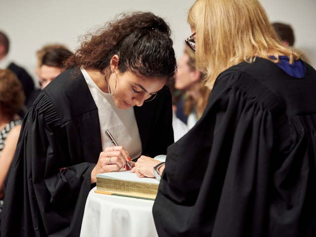 Two girls studying together during an academic tutorial to help the students excel at uni