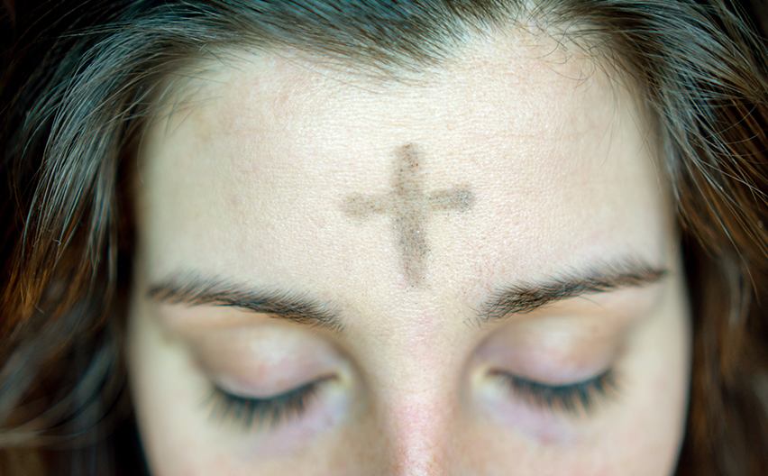 Ash Wednesday, woman with cross on forehead