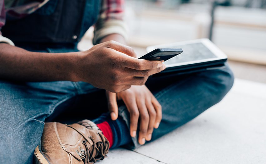 Student with mobile phone