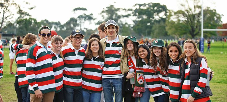 Trinity-College-students-banner-(2).jpg Group of three boys and seven girls, residents of Trinity College happily posing for a group picture on campus.